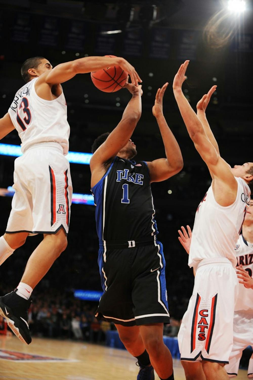 On a night that freshman Jabari Parker struggled, No. 6 Duke fell to the balanced attack of the No. 4 Wildcats, losing 72-66 in the championship game of the NIT Season Tip-Off at Madison Square Garden.