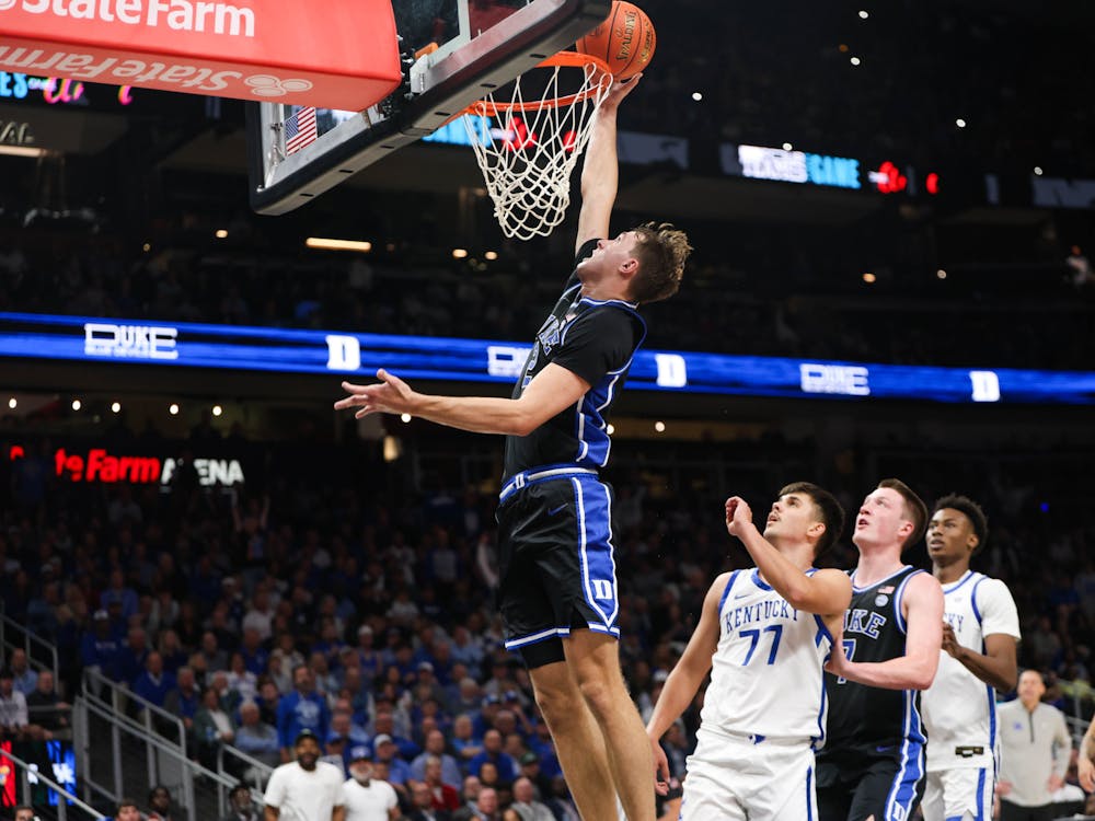 Cooper Flagg goes up for the finish against Kentucky. 