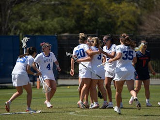 The Blue Devils celebrate a goal during their weekend win against Virginia.