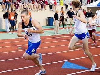Senior Sean-Pat Oswald, left, led Duke’s first-ever 4x800-winning team at the Penn Relays over the weekend.