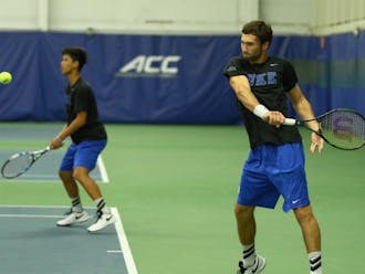 Freshman Catalin Mateas picked up a pair of singles wins and teamed with classmate Vincent Lin for a 2-0 doubles ledger Saturday against Coastal Carolina and Furman.