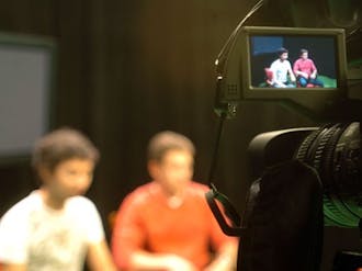 Cable 13, shown filming a show, is revamping its Web site to increase its online viewing audience. The new site will also allow students to submit their own videos.
