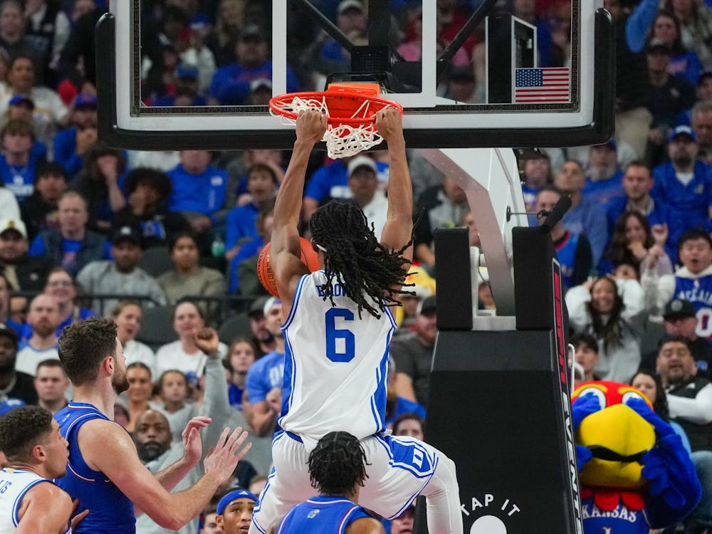 Maliq Brown slams home a finish against Kansas. 