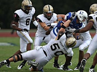 Duke’s offense was constantly enveloped by a swarming, unpredictable Army defense, which caused the Blue Devils to complete only one of its eight third down attempts, and which forced three Duke interceptions and two fumbles.