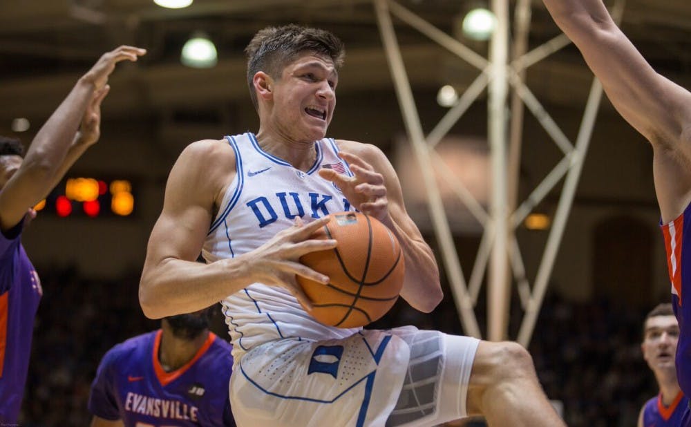 Grayson Allen led a balanced Duke attack in the first half and had to play point guard early with Trevon Duval in foul trouble.
