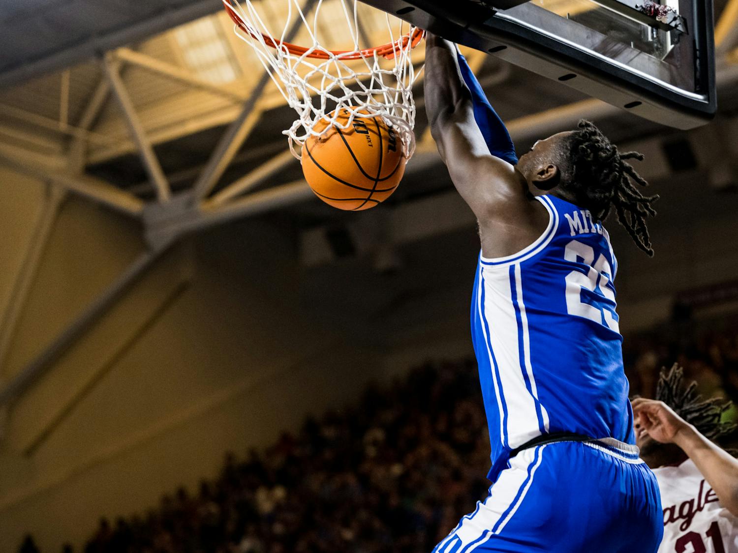 Mark Mitchell slams home the dunk against Boston College.