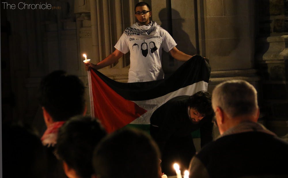 <p>Duke Students for Justice in Palestine held a candlelight vigil for victims of Israeli violence Oct. 14—one of many efforts to raise awareness on campus about the Israel-Palestine conflict.</p>
