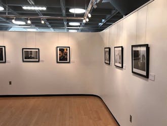 "black.," which opened Monday in the Louise Jones Brown Gallery, features photos of black Americans met by senior Evan Nicole Bell.