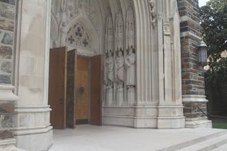 Lee's statue is located to the right of Duke Chapel's front doors.