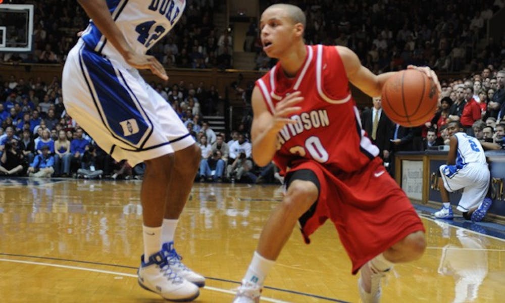 Davidson’s Stephen Curry led his team to the 2008 Elite Eight—and garnered his school national attention.
