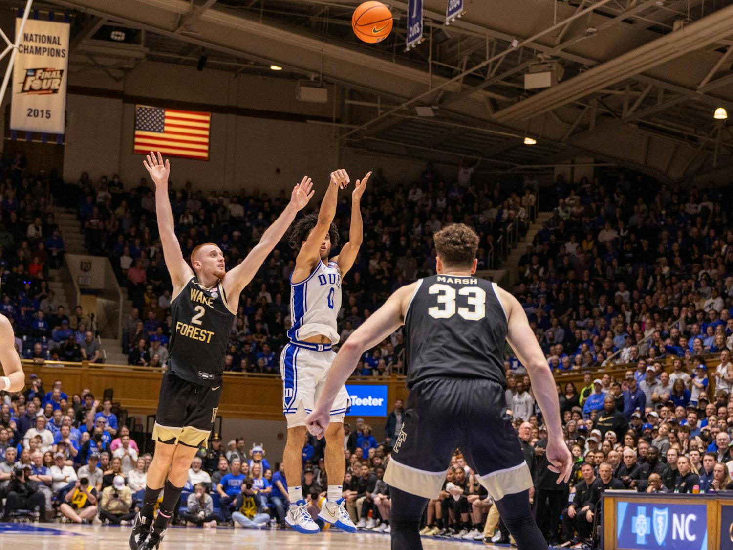 Jared McCain unleashes a shot from three during Duke's win against Wake Forest.