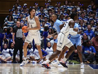 Freshman center Dereck Lively II scans for options during Duke's Feb. 4 win against North Carolina.