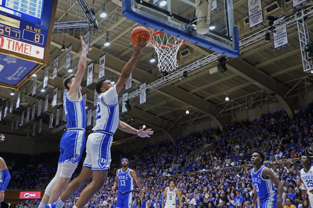 Kale Catchings drives past Kyle Filipowski and goes up for the layup during Countdown to Craziness.