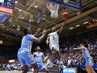 Jeremy Roach surges past North Carolina's RJ Davis to put Duke up by four points with 23 seconds to play.