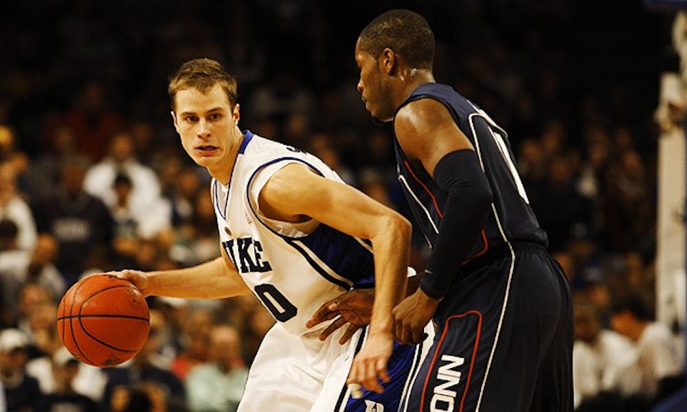 Senior Jon Scheyer was named tournament MVP after scoring 19 points to lead Duke to a win over UConn.