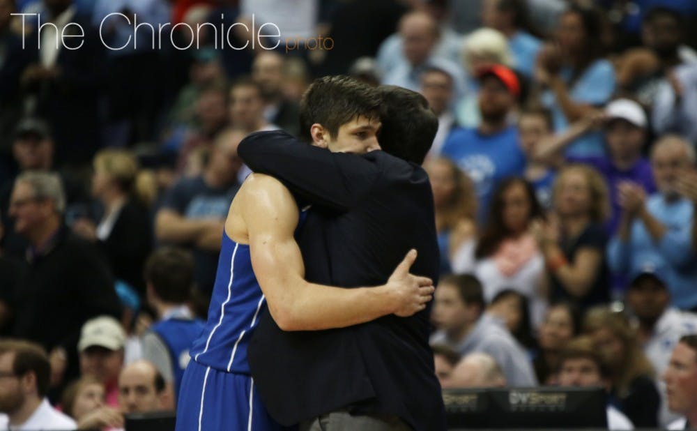 Grayson Allen hugged head coach Mike Krzyzewski after fouling out with less than a minute remaining in overtime.