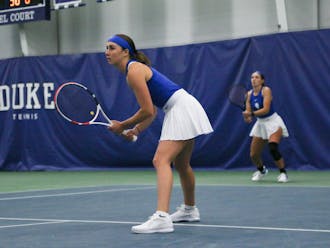Chloe Beck (front) and Ellie Coleman (back) in Duke's home finale against N.C. State April 8.