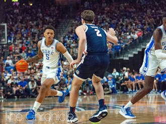 Both Paolo Banchero of second-seeded Duke and Drew Timme of first-seeded Gonzaga were named Wooden Award finalists, and they could meet again in the Elite Eight of the West region.