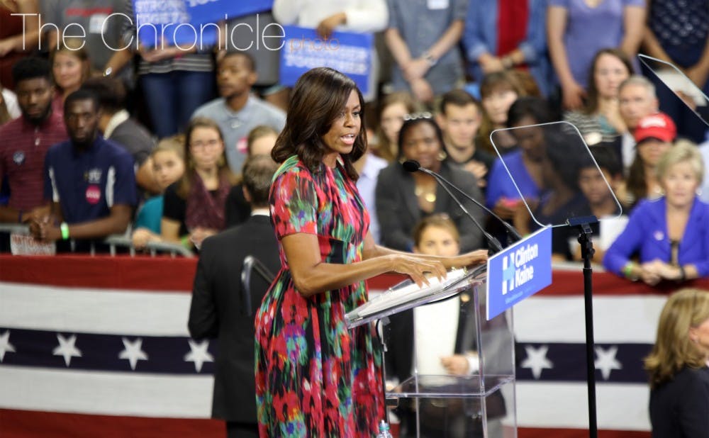 <p>First Lady Michelle Obama praised Democratic presidential nominee&nbsp;Hillary Clinton&nbsp;during a campaign stop in Raleigh Tuesday.&nbsp;</p>