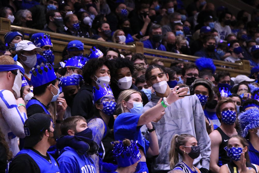 <p>McCain (left) was in attendance at Duke's Feb. 7 game against Virginia.</p>