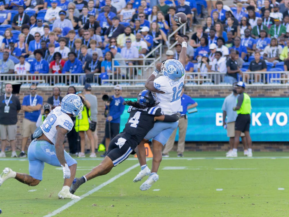 <p>Cameron Bergeron pressures North Carolina quarterback Jacolby Criswell.&nbsp;</p>