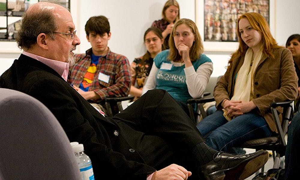 Author Salman Rushdie, pictured speaking to students, discussed the notion of viewing novelists as news gatherers bringing national issues to public attention.