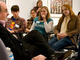 Author Salman Rushdie, pictured speaking to students, discussed the notion of viewing novelists as news gatherers bringing national issues to public attention.