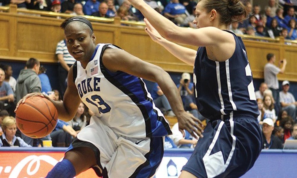 Karima Christmas and Kathleen Scheer each scored in double digits to help Duke top Brigham Young Saturday.
