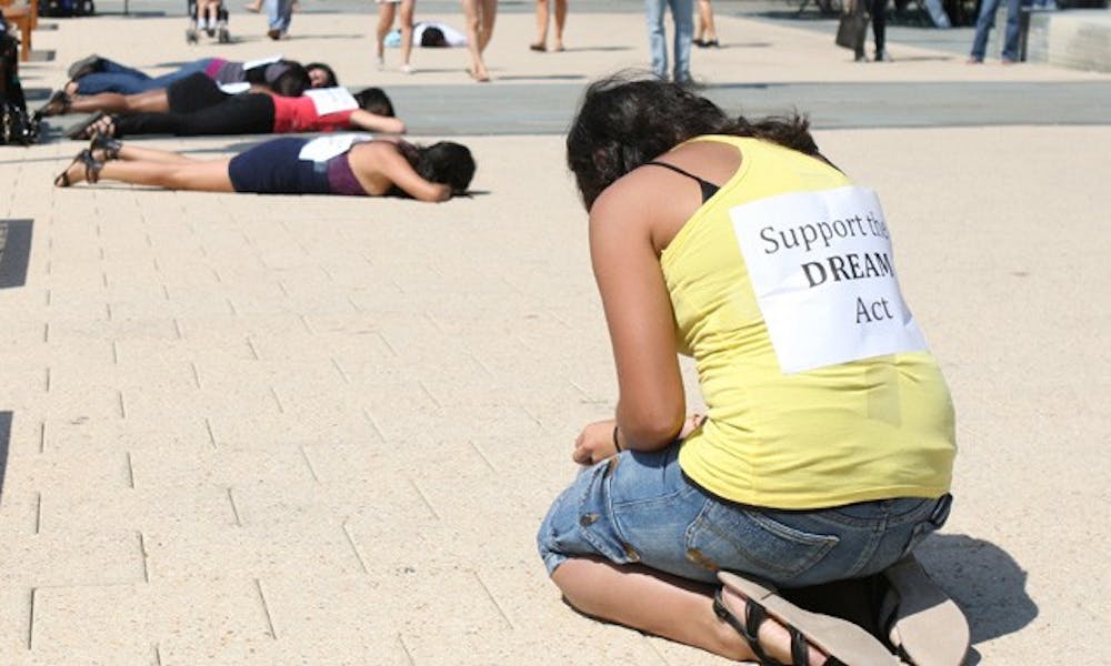 Students hosted  a “die-in” on the Bryan Center Plaza earlier this Fall to raise awareness and support for the Dream Act.
