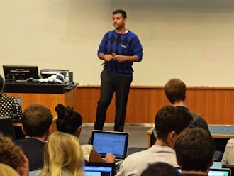 Executive Vice President Abhi Sanka addresses the DSG Senate at their meeting Wednesday, where a resolution was passed to support changing the name of the Women's Studies department.