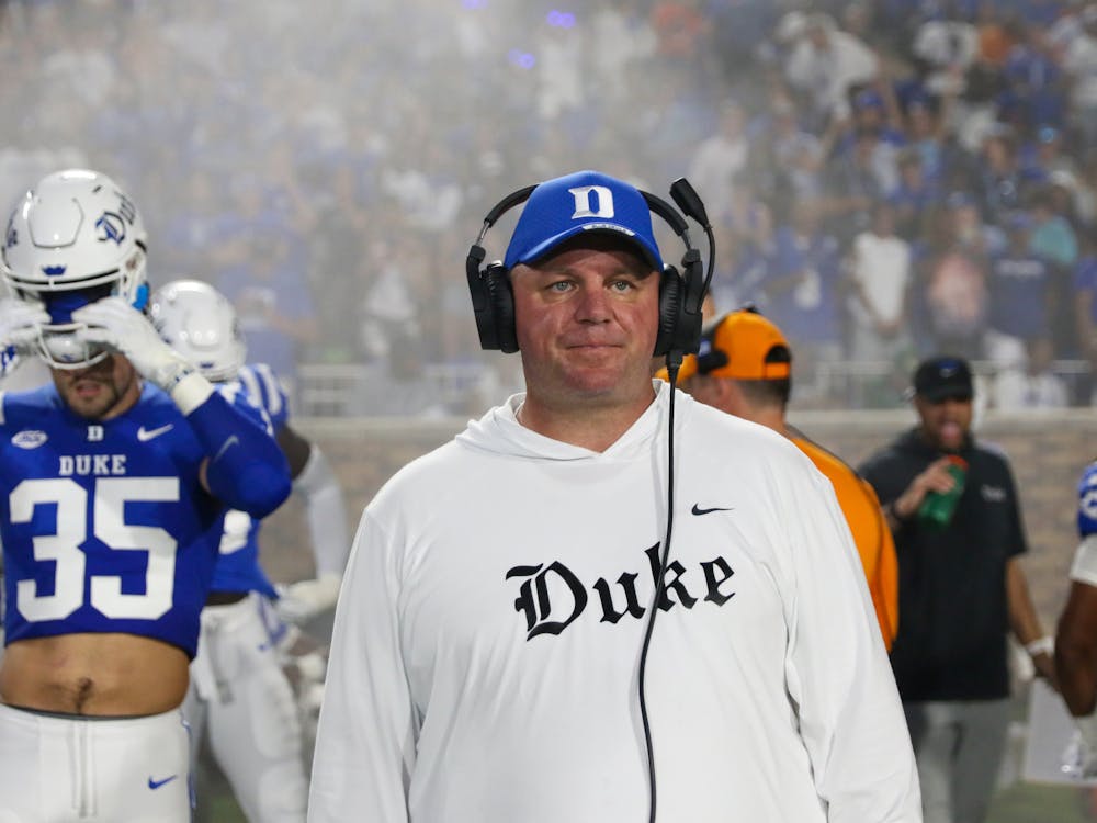 <p>Head coach Mike Elko mans the sidelines for the Blue Devils.</p>