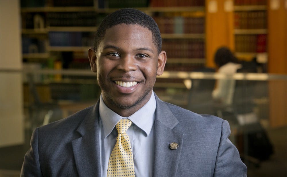 Duke School of Law student Marcus Benning in the law library