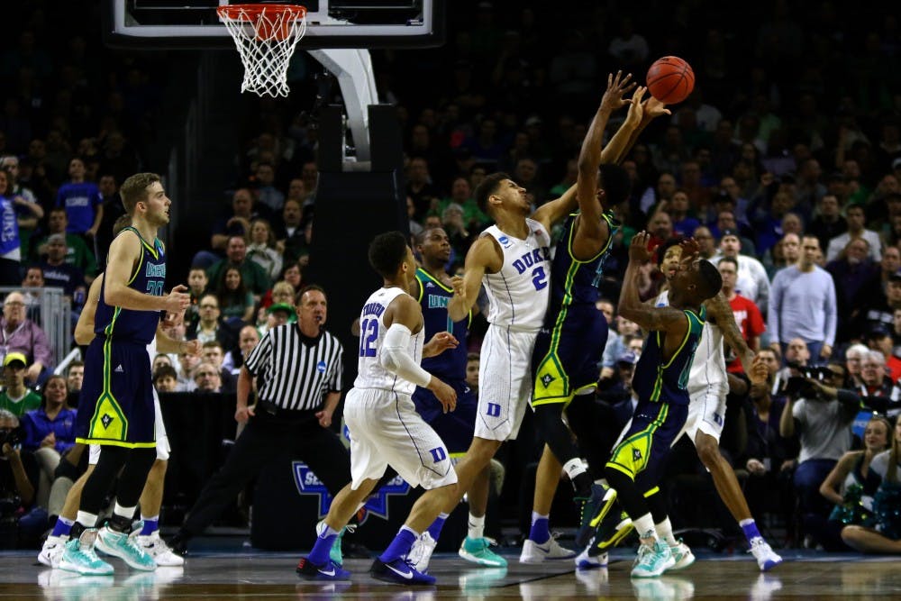 Freshman Chase Jeter came up with a key block in the final 27 seconds to help the Blue Devils fend off UNC-Wilmington's comeback bid.