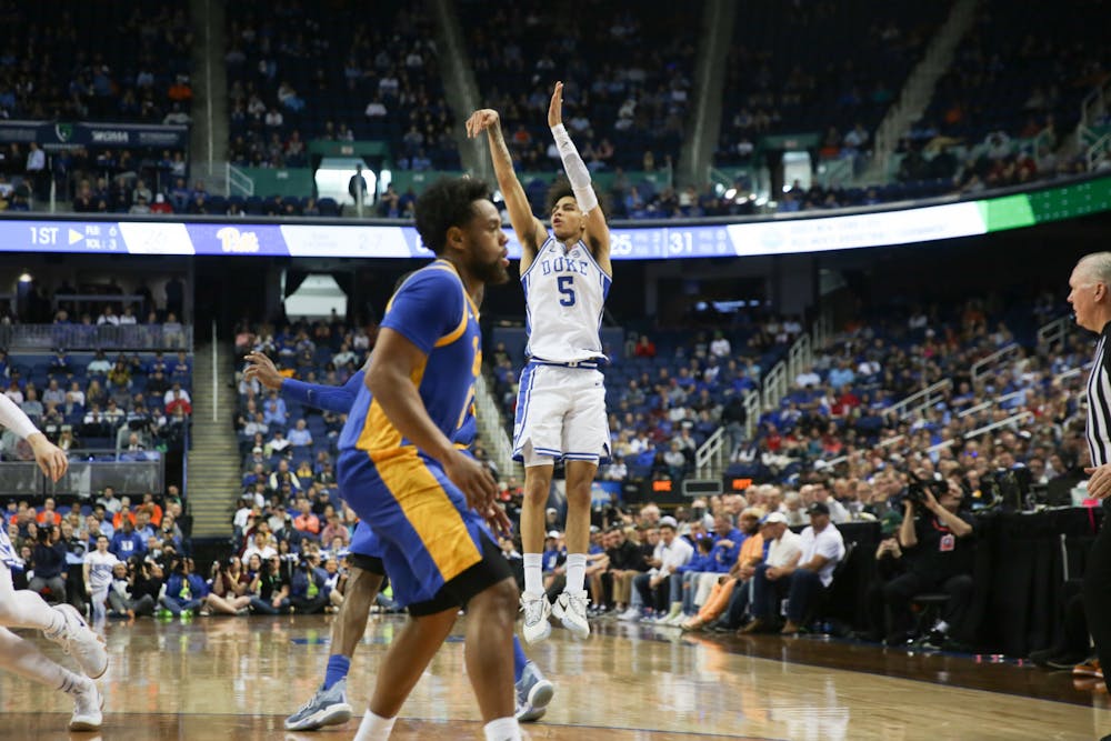 Freshman guard Tyrese Proctor shoots a 3-pointer in Duke's win against Pittsburgh in the ACC tournament quarterfinals.
