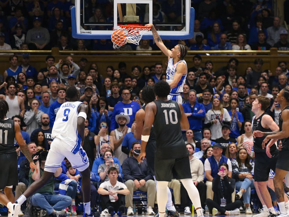 Blue Devil guard Tyrese Proctor goes up for the slam in Duke's victory against Virginia Tech. 