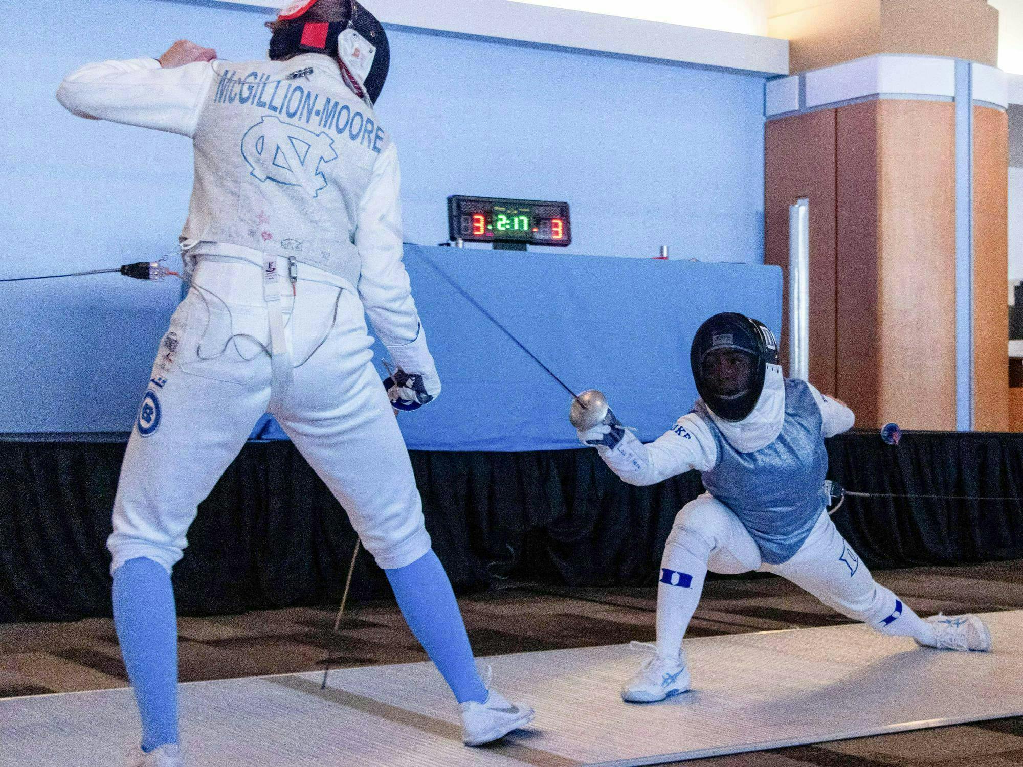 Duke men's fencing defeats North Carolina 14-13, women fall 16-11 - The ...