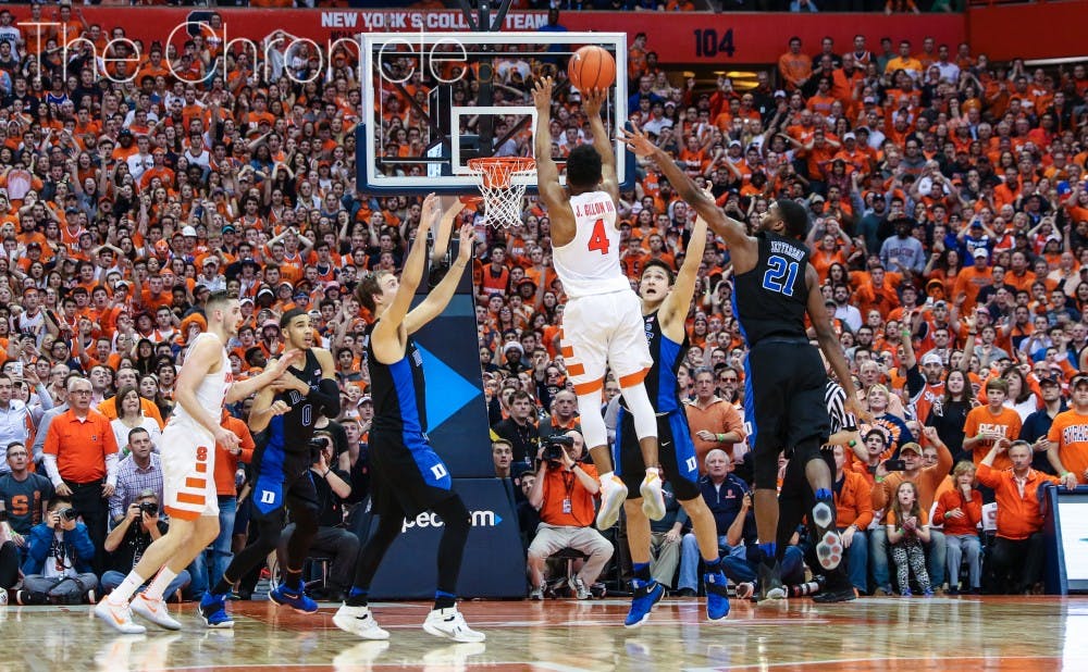 John Gillon raced up the court and banked home a 25-foot 3-pointer to give Syracuse an upset win Wednesday night and end Duke's seven-game winning streak.&nbsp;