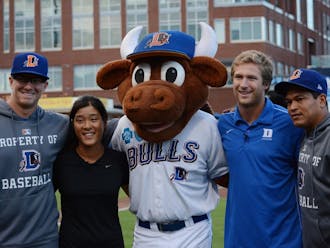 The Durham Bulls honored Duke’s two national championship teams Monday as Celine Boutier and Will Haus threw out the first pitch in front of an excited Durham crowd.