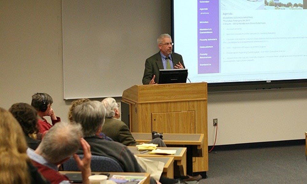 Eric Mlyn, the leader of DukeEngage for more than a decade, has stepped down. In this 2013 photo, he was addressing Academic Council about the program. 