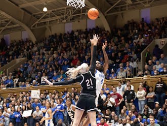 Jadyn Donovan shoots over coverage during Duke's first half against South Carolina.