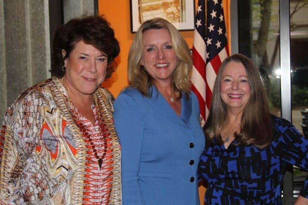<p>Deborah Lee James (middle) is one of the highest ranking Duke alums in government as secretary of the Air Force. She gave an address during a luncheon hosted by Duke Campus Club Monday.</p>