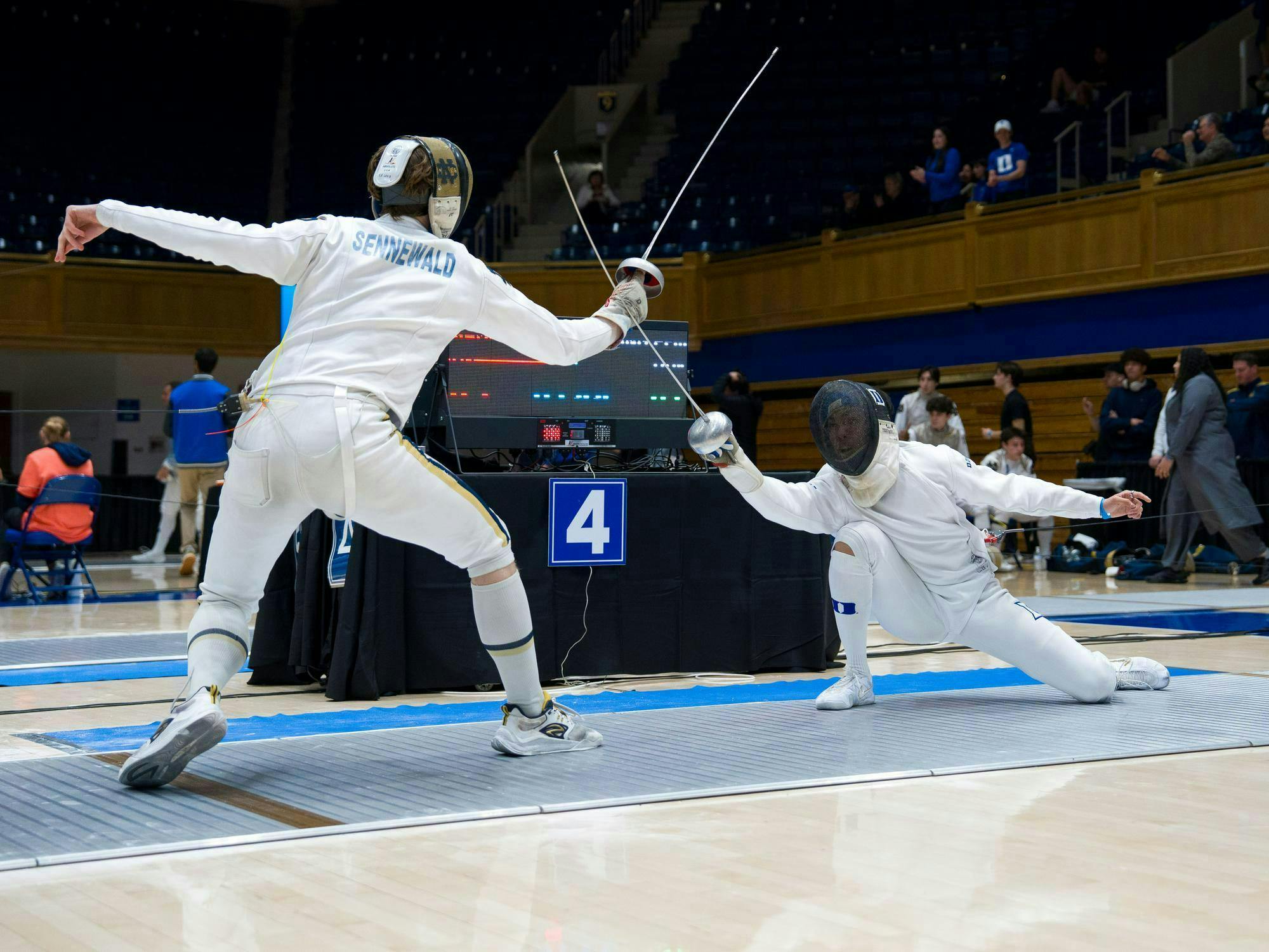 'A really unique thing': How Duke fencers Peyton Young and Kunling Tong ...