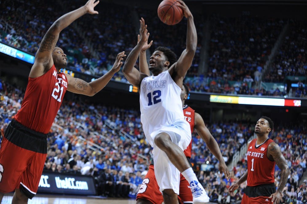 Justise Winslow scored all 11 of his points in the first half to fuel the Blue Devils' big first half against N.C. State.