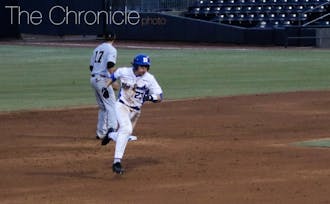Chris Proctor drew a seven-pitch walk-off walk to win the Blue Devils' last game at the Durham Bulls Athletic Park of the year.