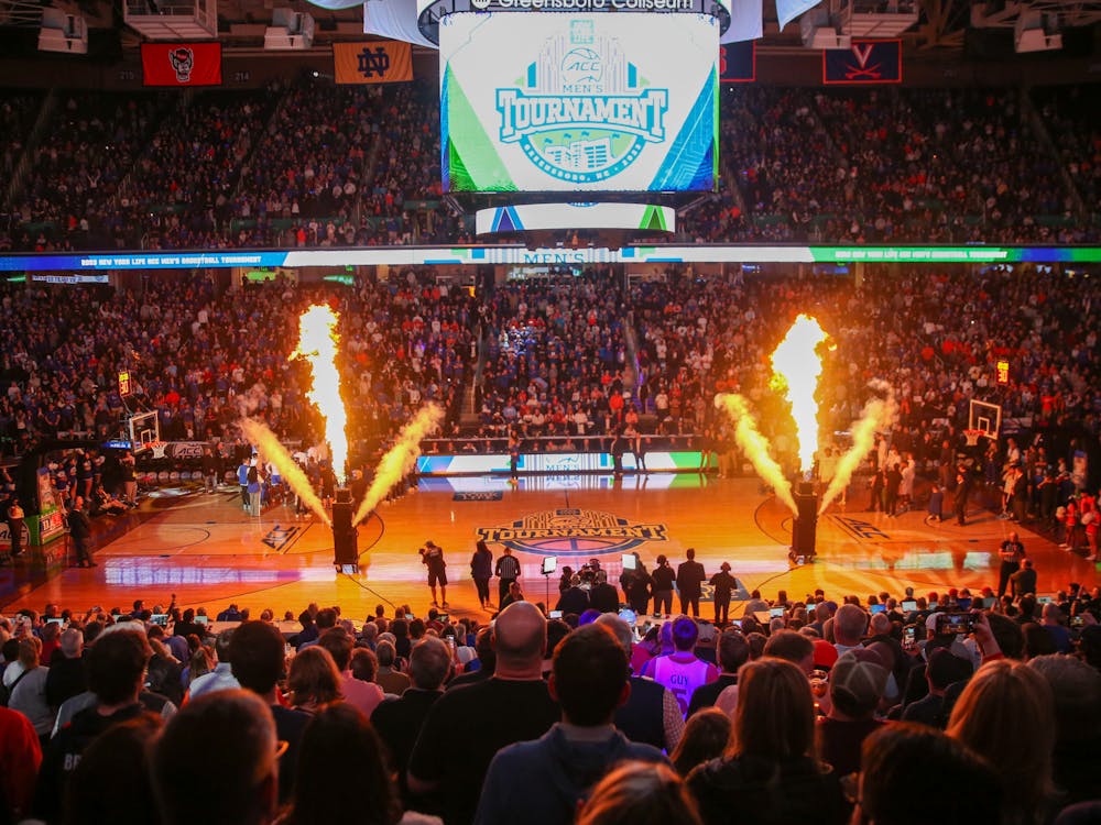 Flames erupt along with the majority Duke-supporting crowd during player introductions ahead of the ACC championship game.