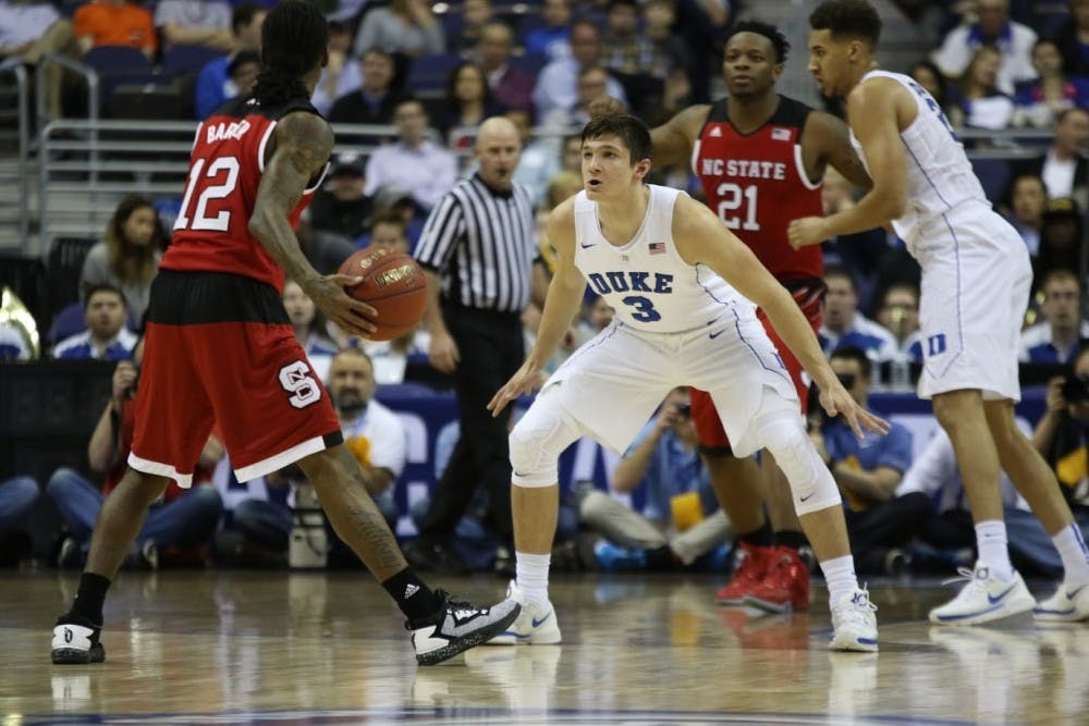 Grayson Allen and the Blue Devils shut down N.C. State’s go-to-play to earn a trip to the ACC tournament quarterfinals.