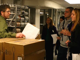 Members of the Duke University Student Dining Advisory Committee toured the Great Hall’s kitchen and heard from manager Tony Preiss (left) about the dining hall’s daily operations during the group’s meeting Monday.
