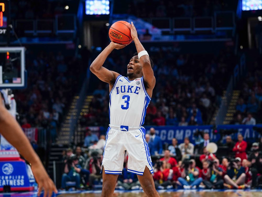 Jeremy Roach loads up a shot during Duke's loss to N.C. State.