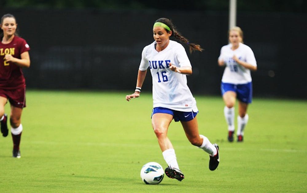 With two goals, including one in golden-goal overtime, Laura Weinberg lifted Duke past Virginia Tech 3-2 Thursday night.