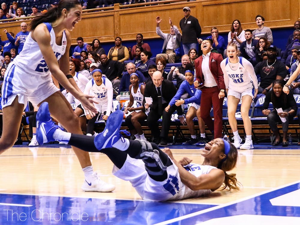 Lambert (right) had been one of the key sparks for Duke's turnaround this season.